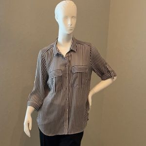 3/4 sleeve convertible button down blouse.